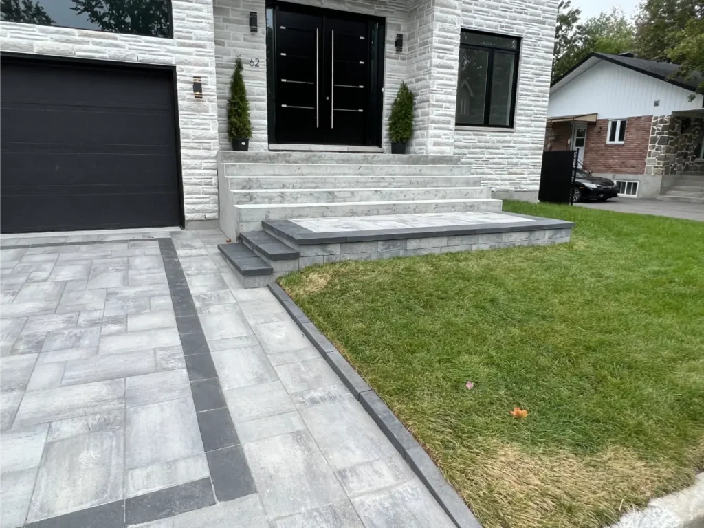 Projet résidentiel à Blainville – pavé uni, terrasse et muret décoratif